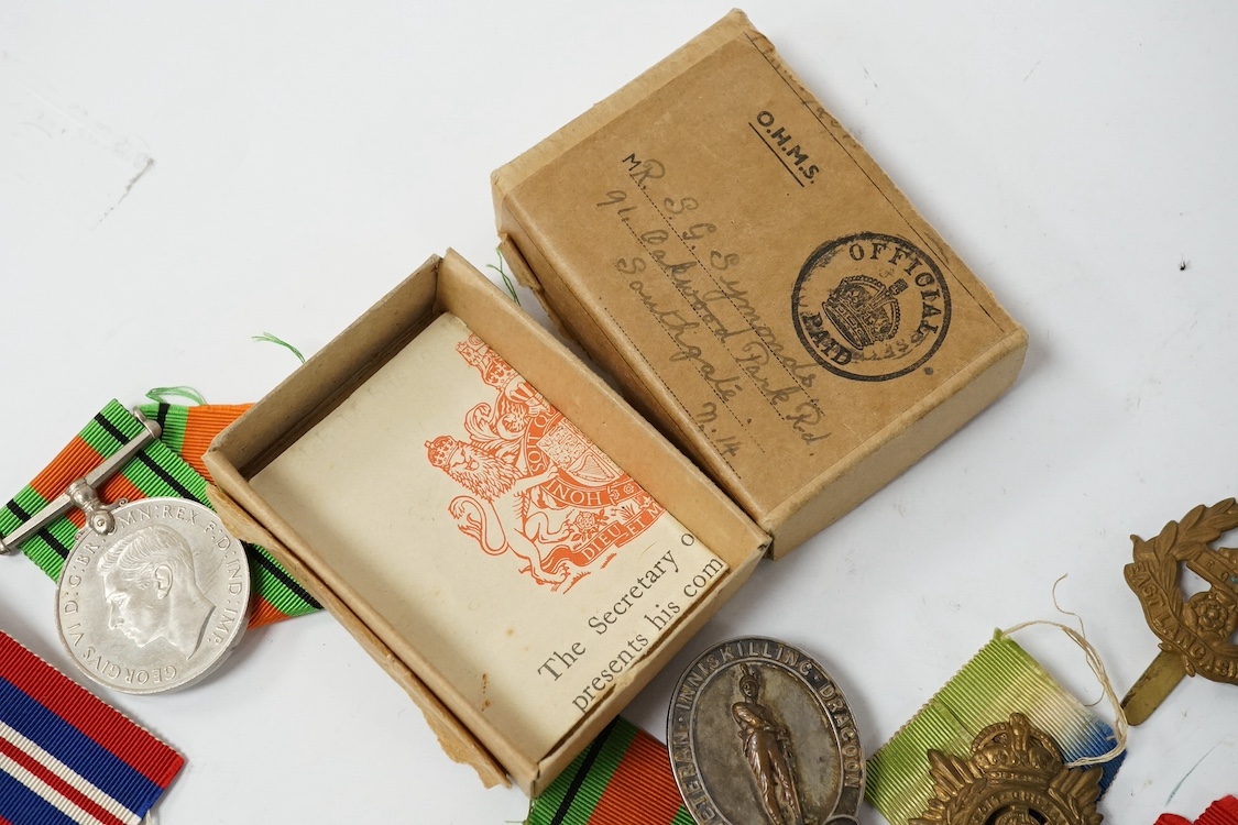Nine military medals including; a First World War medal pair to T3-026887 DVR. C. Oldfield. A.S.C., a WWII group comprising; The Atlantic Star, The 1939-1945 Star, The Italy Star and The 1939-1945 Medal with a clasp for